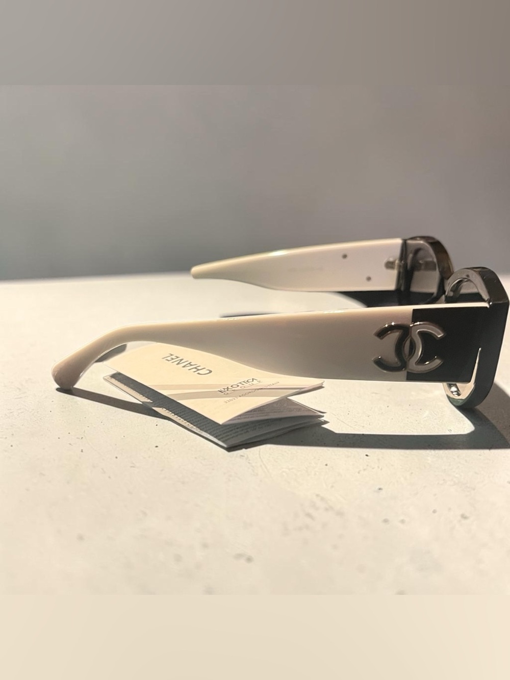 Chanel CH5525 rectangle sunglasses, featuring a two-tone black and white frame.